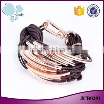 Western style fashion jewelry wax string gold zinc alloy multilayer woven bracelet                        
                                                                                Supplier's Choice