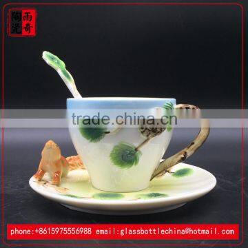 white porcelain coffee cup and saucer