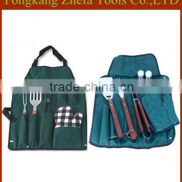 cheap price stainless steel fork tongs wood handle fabric bbq apron tools set                        
                                                Quality Choice