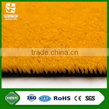 Synthetic plastic decorative track grass