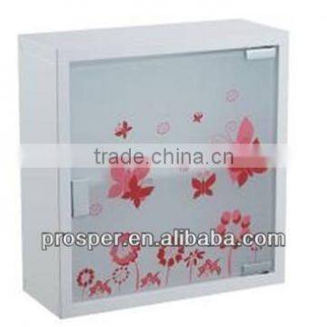 small metal medicine cabinet with butterfly pattern