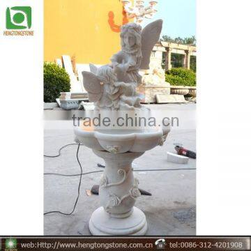 White marble angel fountains