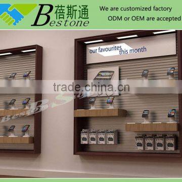 Usefull wall mobile rack for mobile store decoration