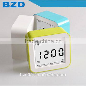 Best Teenager Home Promotional Gift OEM Multi-function Smart Digital Rotation Control Auto Light LCD Bedside Alarm Table Clock