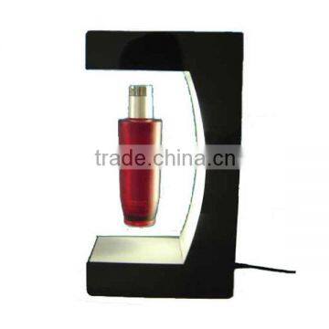 Top floating magnetic levitating cosmetic display stand