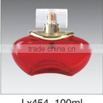 big red colored perfume glass bottle with lid