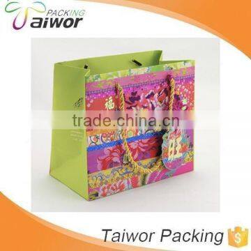 Made in China Special Design Matt Coated Paper Gold Stamping Logo Gift Bag