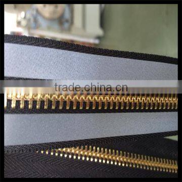TPU Wholesale Clothing With Brass Reflective Zipper photo-5