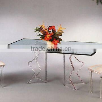 Clean glass dining table and chairs set