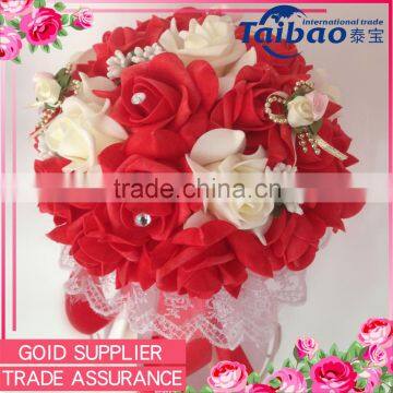 Beautiful handmade bridal red foam wedding bouquet with ribbon and binding rope