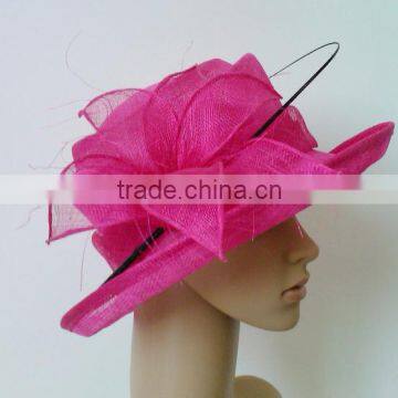 Fuschia sinamay hat trimming with black ostrich quill