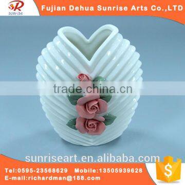 Beautiful artificial flower with loving type vase