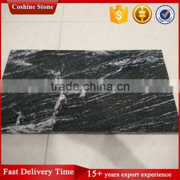 Polished and Flamed Iron Snow White Black Lactea Granite Tiles photo-2
