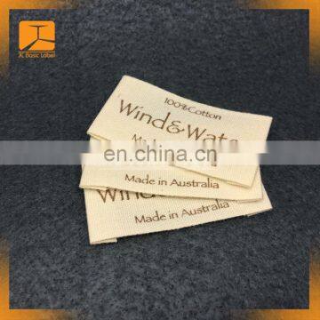antique metal brass decorative rivets wholesale natural color background custom brand logo cotton printed tags for gorment