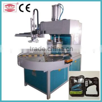 Automatic high frequency paper clamshell packing machine With Robot Hand