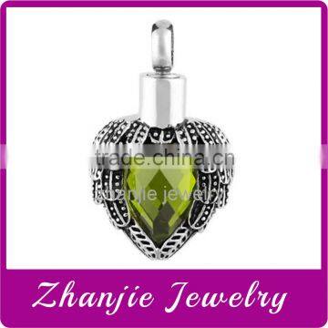 Top Quality Memorials Angels Near Heart Stainless Steel Cremation Urn Jewelry Pendant With Big Eye Shape Peridot Stone