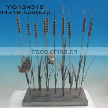 metal bird in paddy for garden decoration