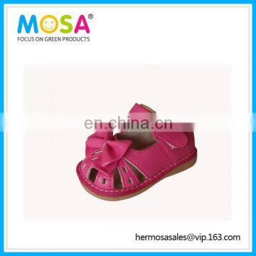 Fashion Baby Girl Squeaky PU Leather Sandals with Bow