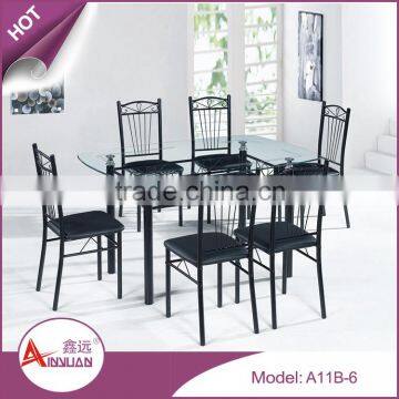 Wholesale modern design dining room table set 9mm thick cheap black glass top dining table 6 chairs set