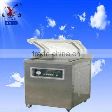 Single chamber vacuum packaging machine