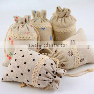 New design small flowers fancy storage jute bag made in china                        
                                                                                Supplier's Choice