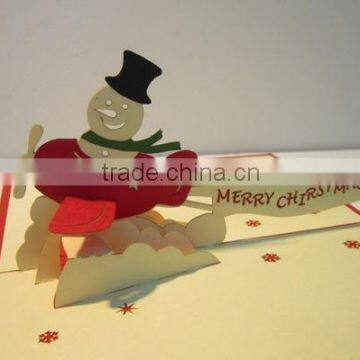 Snowman flying greeting card