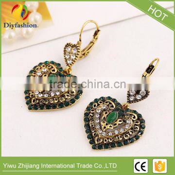 Retro Bohemian Dirr Heart-shaped Resin Gold Plated Ear Clip photo-2
