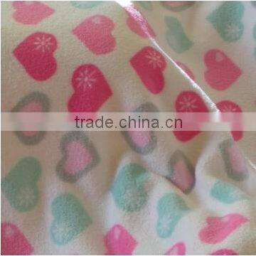 A heart-shaped coral fleece blanket for children