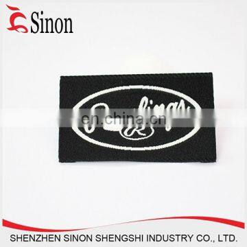 China Shenzhen heat cut polyester care fabric label clothing brand label paper hang tag