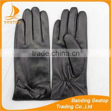 The best quality leather gloves ladies and girls leather gloves with Bud silk pattern leather bow