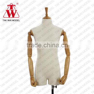 Fashionable nude lady with wooden arm mannequin