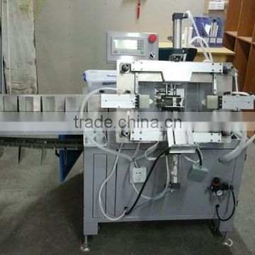 Semi-automatic sanitary napkin packaging machine