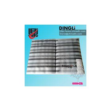 Magnetic stripe coated overlay