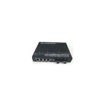 Low Power 4w 1000m TP Fiber Optic Switch Box 4 Port Supports Vlan And Qos