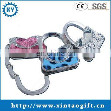 Beautiful flower shaped safety metal bag hanger for promotional