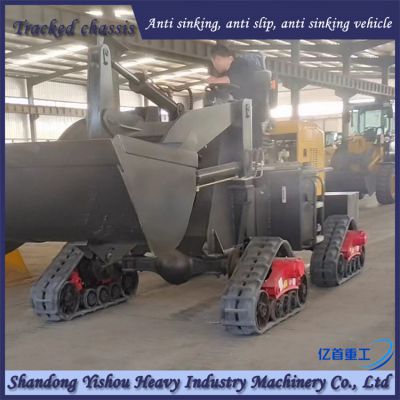 Loader modification with triangular track wheel anti-skid