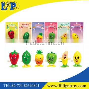 Kids funny plastic jumping wind up fruit toy