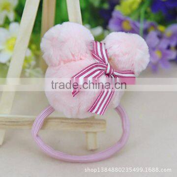 Hair band with pompom ball