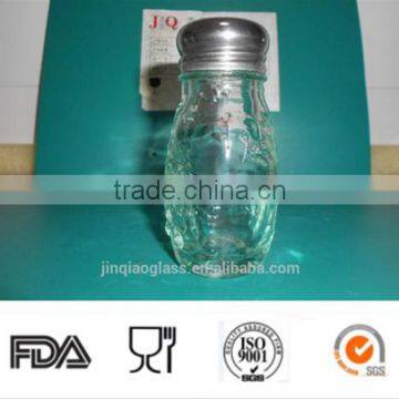 different glass spicy jar with cap