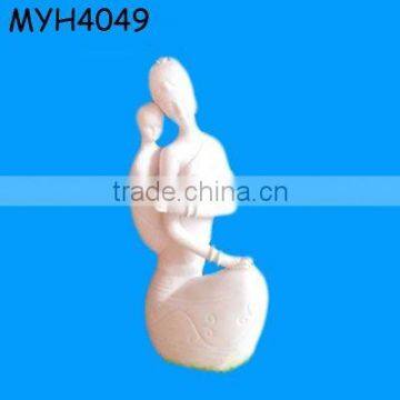 Caring mother carrying bady bisque figurine