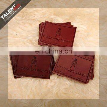 High Quality Customized Private Brand Name Logo Jeans Genuine Leather Patch in Garment photo-3