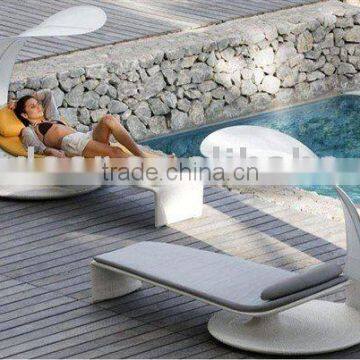 rattan chaise lounge or wicker sun bed