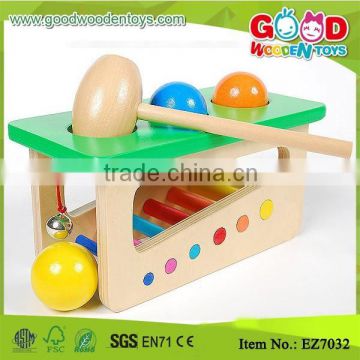 Toddlers Play Wooden Pounding Ball / Balls Slid on Xylophone