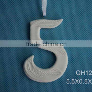 White Ceramic numbers Christmas decoration indoor