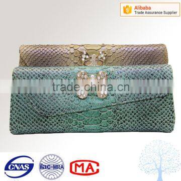 Wallet evening bag in colorland with metal lock in falp