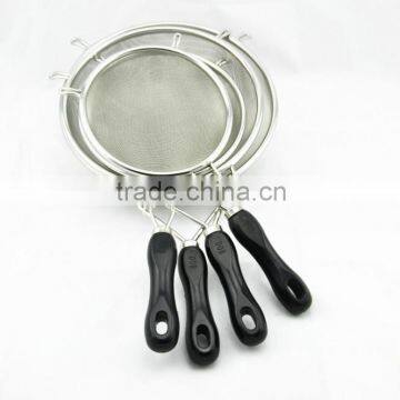 Mesh strainer with black plastic handle