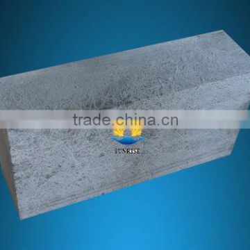 Fused cast skid rail block for tapping platform style walking beam furnace