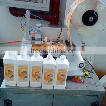 Semi Automatic Bottle Filling Capping And Labeling Machine photo-3