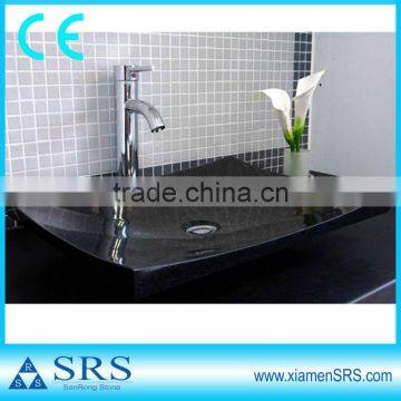 Polishing black granite sink