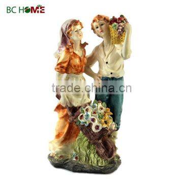 2015 New design Garden Decorations young couple with wheelbarrow